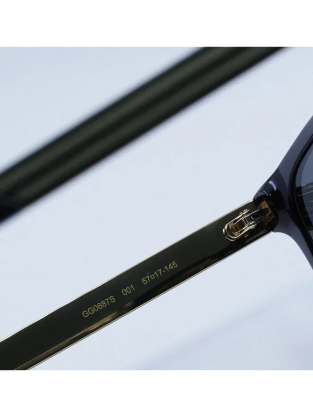 Gucci GG0687S 001 Sunglasses Black Square Frame, Grey Lenses